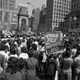 Thousands of New York's garment workers have left their midtown factory lofts and rally at Herald Square, during a demonstration against the import of clothing from overseas, on April 13, 1977. (AP Photo)